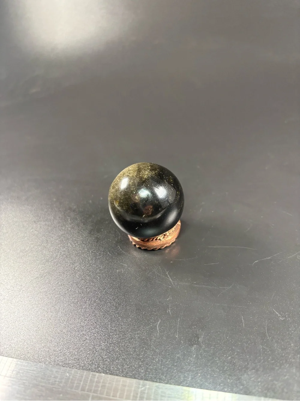 Black gemStone Sphere comes with copper ring and gemstone